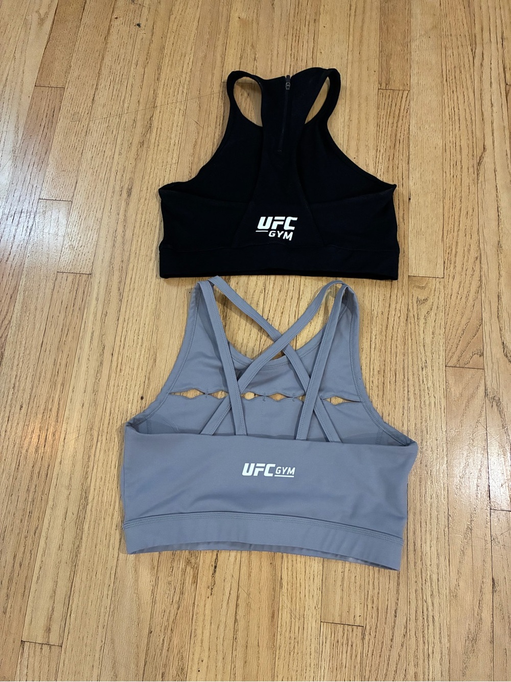 Two UFC GYM Sports Bras - Black & Gray